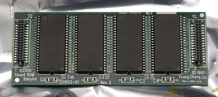 DSC_8142.jpg - The Orchestral ROM chips labeled K2K ROM 1-1, 1-2, 1-3, 1-4 Also notice the connectors on each side of the board are labeled J1 and J2