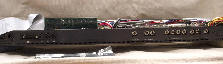 DSC_8151.jpg - Compared to the rest of the keyboard, the Daughterboard is the tallest thing in there! I had to carefully route the hard drive power cable when re-attaching the bottom cover. Do not jam down on it! You will break the Daughterboard or system board underneath!